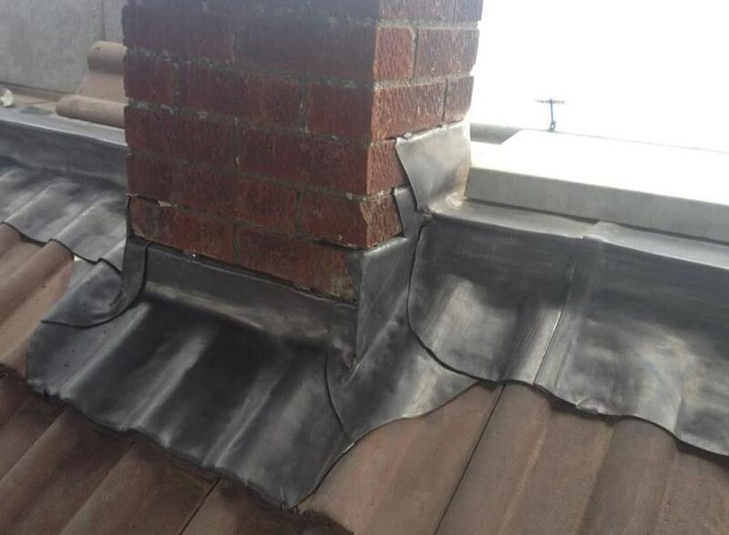 Professional chimney maintenance completed by Johnson's Roofing in Stockport, Manchester area - High quality concrete tiles installation