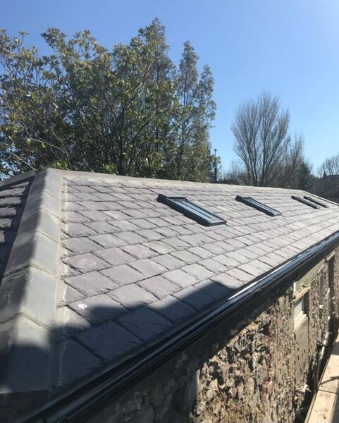 Professional pitched roof installation completed by Johnson's Roofing in Wigan, Manchester area - High quality cedar shingles installation