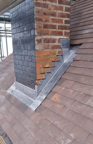 Professional tile roof repair completed by Johnson's Roofing in Didsbury, Manchester area - High quality clay tiles installation