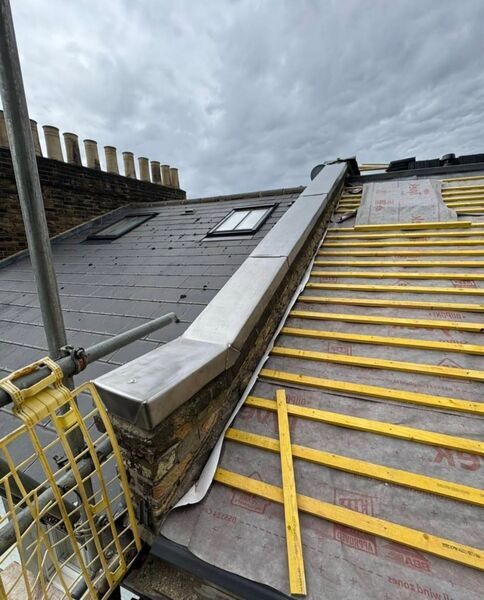 Professional roof insulation completed by Johnson's Roofing in Stockport, Manchester area - High quality metal roofing installation