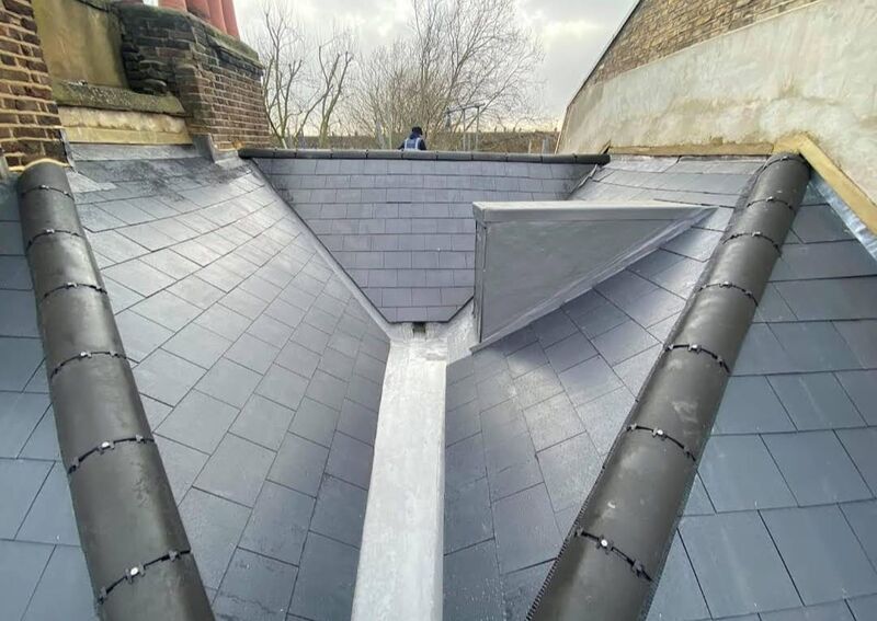 Professional tile roof repair completed by Johnson's Roofing in Salford, Manchester area - High quality clay tiles installation