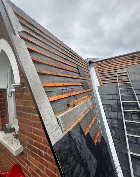 Professional lead flashing work completed by Johnson's Roofing in Withington, Manchester area - High quality concrete tiles installation