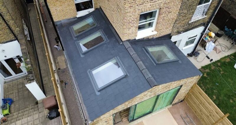 Professional moss removal service completed by Johnson's Roofing in Oldham, Manchester area - High quality composite materials installation