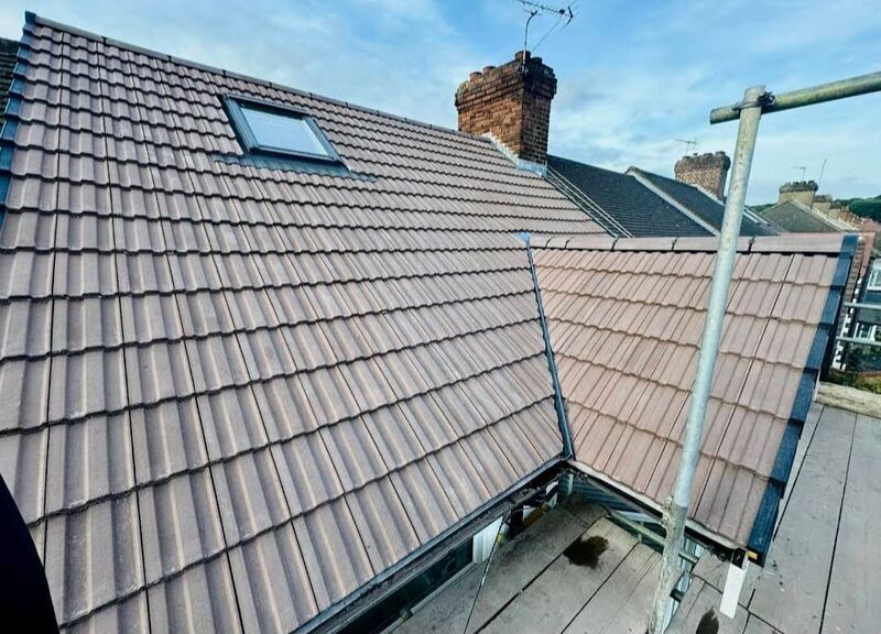Professional tile roof repair completed by Johnson's Roofing in Wigan, Manchester area - High quality clay tiles installation