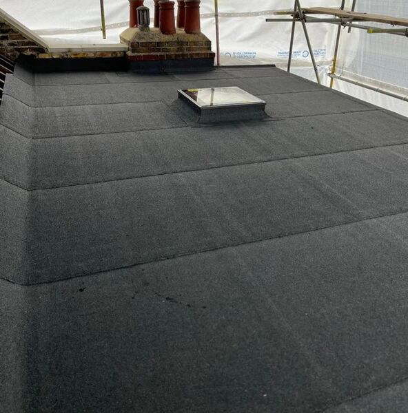 Professional chimney maintenance completed by Johnson's Roofing in Bolton, Manchester area - High quality concrete tiles installation